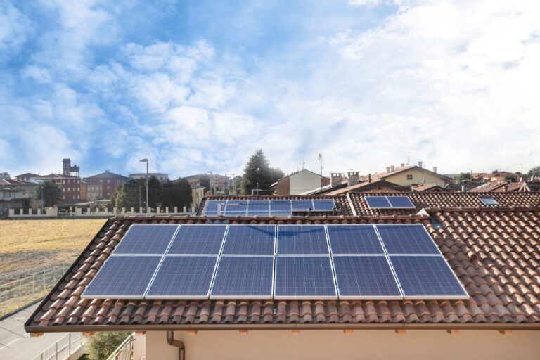 Solar panel on a red roof. Renewable energy source. Present technology.